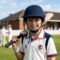 image of child in cricket gear wearing contact lenses
